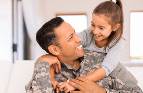 soldier with daughter on back