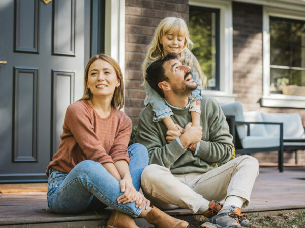 Family in front of their home